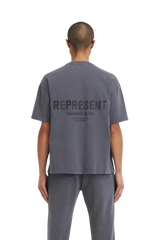 Back view of SS24 Owners Club Rubber Logo T-Shirt by Represent in dark gray color