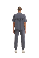 Gray SS24 Owners Club Rubber Logo T-Shirt from Represent featuring a modern design and relaxed fit