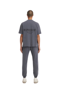 Gray SS24 Owners Club Rubber Logo T-Shirt from Represent featuring a modern design and relaxed fit