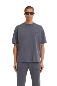 Representation of SS24 Owners Club Rubber Logo T-Shirt in gray on a model for casual fashion look