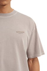 SS24 Owners Club Rubber Logo T-Shirt in Light Gray by Represent with subtle branding on the chest