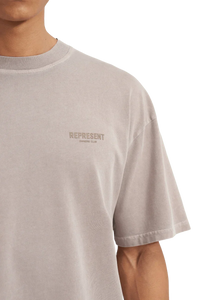 SS24 Owners Club Rubber Logo T-Shirt in Light Gray by Represent with subtle branding on the chest