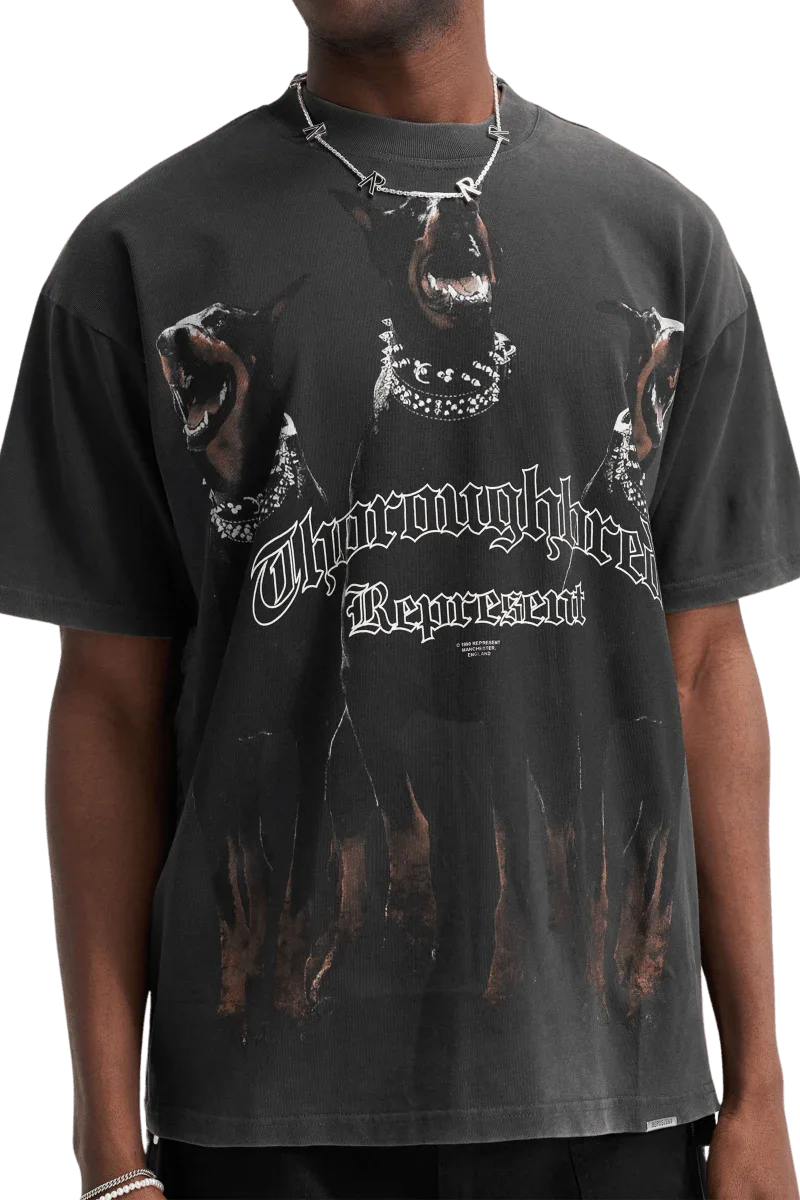 Represent Thoroughbred Tee featuring bold graphics of dogs on a dark background for streetwear style