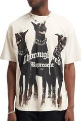 Represent Thoroughbred Tee featuring graphic of three Doberman dogs in bold design on a cream background