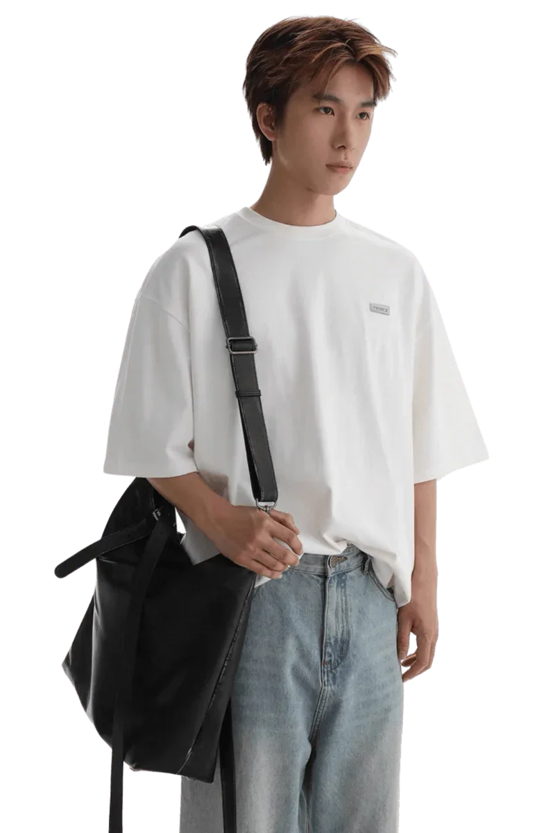 Masonprince Small Logo Basic Tee white oversized fit worn with light blue jeans and black shoulder bag