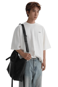 Masonprince Small Logo Basic Tee white oversized fit worn with light blue jeans and black shoulder bag
