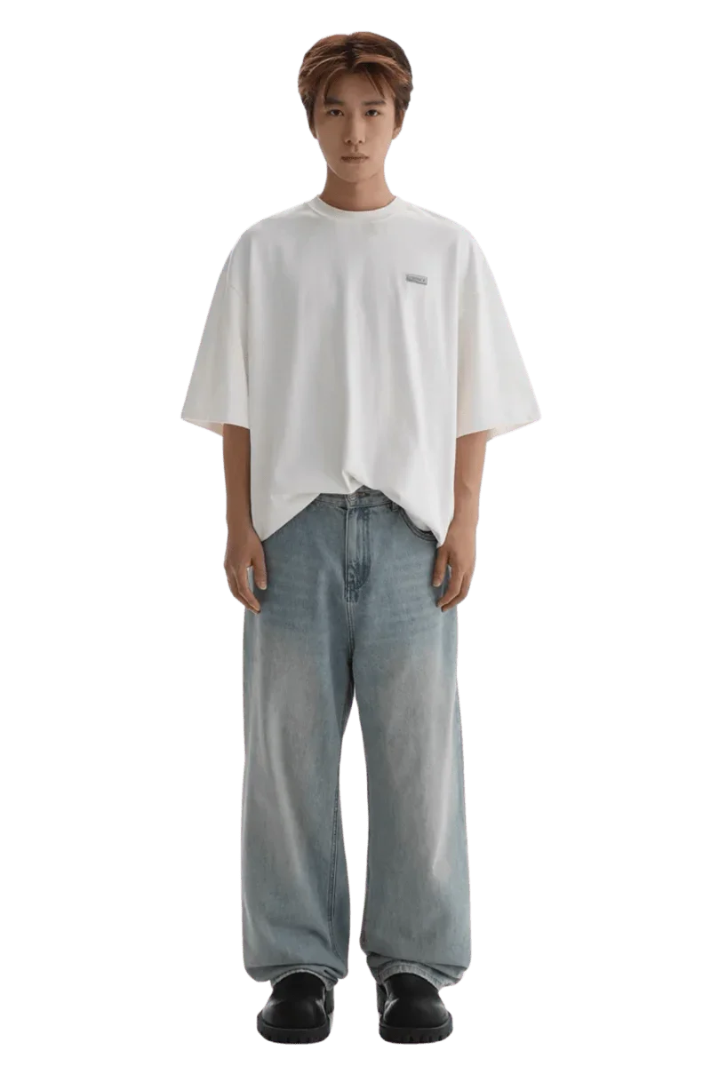 Masonprince Small Logo Basic Tee in white worn with loose blue jeans and black shoes