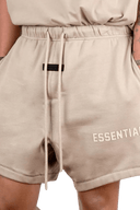 Fear Of God Essentials SS23 Rubber Embossed Shorts in Beige with Elastic Waist and Side Pockets