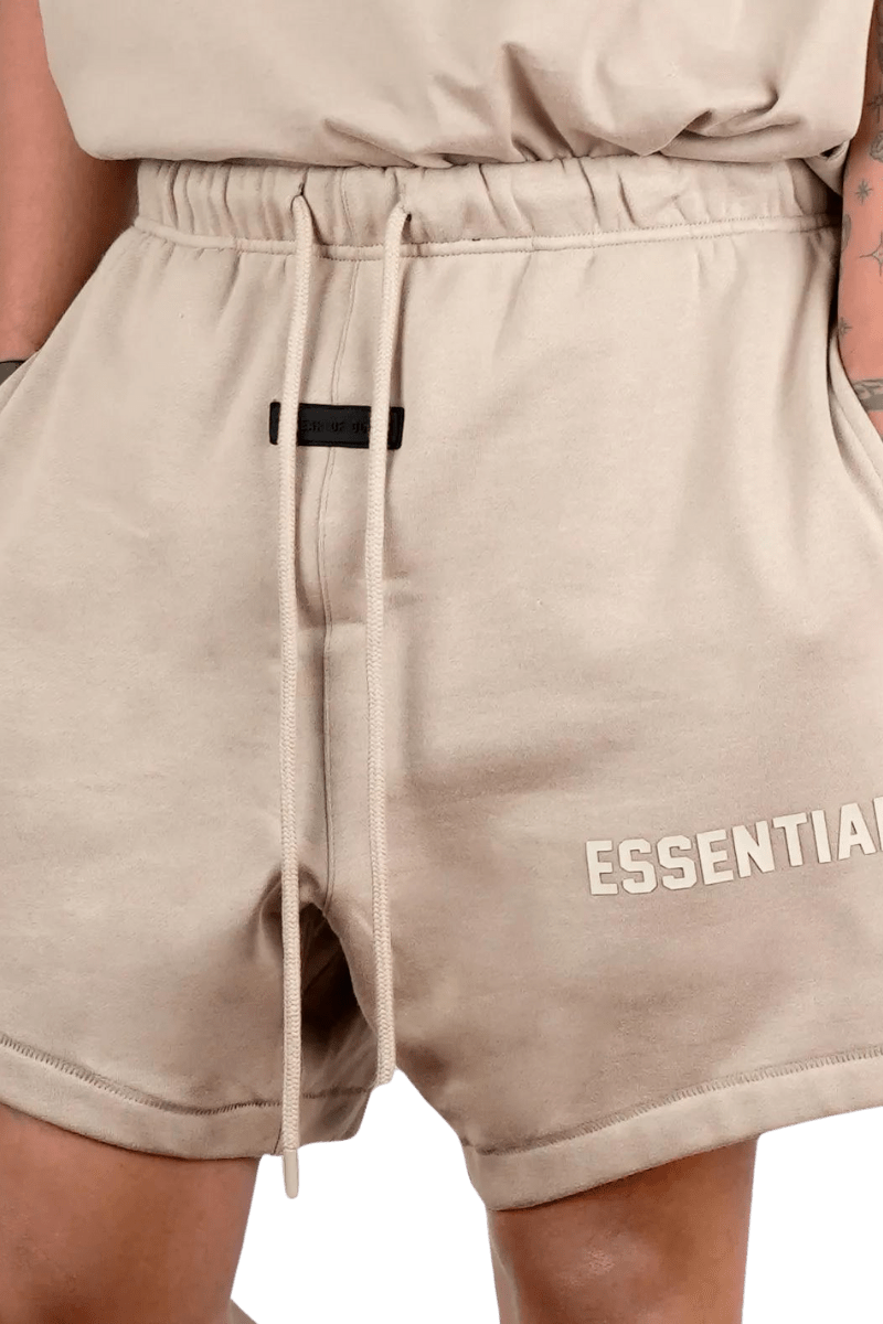Fear Of God Essentials SS23 Rubber Embossed Shorts in Beige with Elastic Waist and Side Pockets