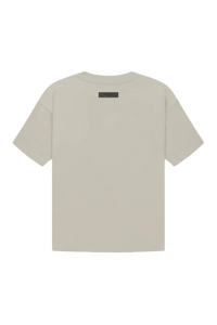 Fear Of God Essentials FW22 Flock Logo Tee in light beige with a minimalist design