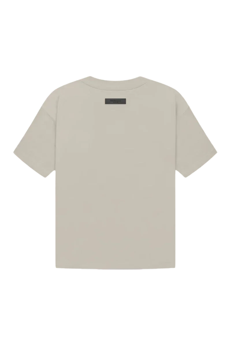 Fear Of God Essentials FW22 Flock Logo Tee in light beige with a minimalist design