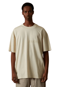 Fear Of God Essentials FW22 Flock Logo Tee in Cream Color with Relaxed Fit and Minimalist Design