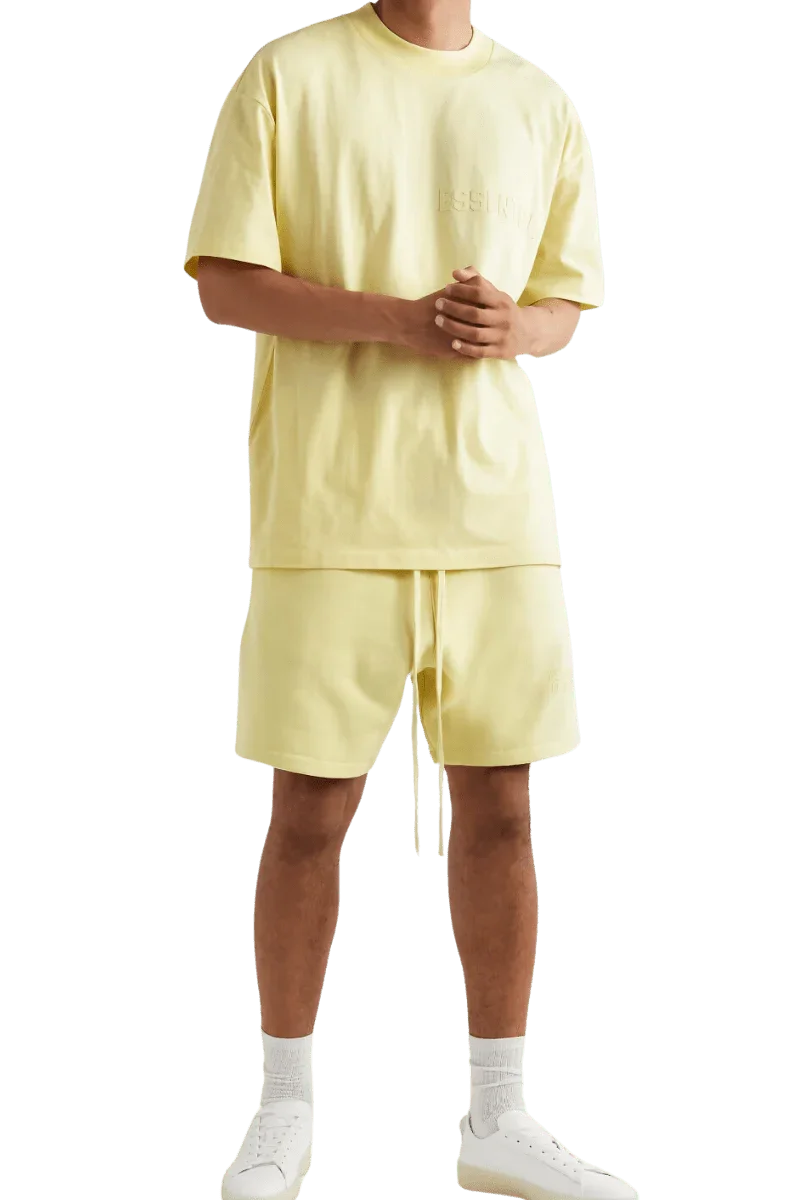 Fear Of God Essentials FW22 Flock Logo Tee in soft yellow with a relaxed fit for casual wear