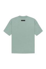 Fear Of God Essentials SS23 Rubber Embossed Tee in mint green color with a sleek minimalist design