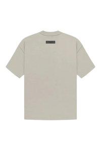 Fear Of God Essentials SS23 Rubber Embossed Tee in neutral tone with relaxed fit and signature branding