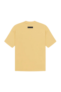 Fear Of God Essentials SS23 Rubber Embossed Tee in soft yellow with a minimalist design