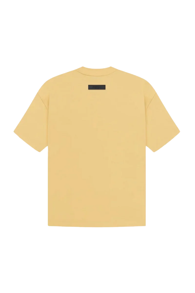 Fear Of God Essentials SS23 Rubber Embossed Tee in soft yellow with a minimalist design