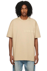 Fear Of God Essentials SS23 Rubber Embossed Tee in beige with a relaxed fit and logo detail