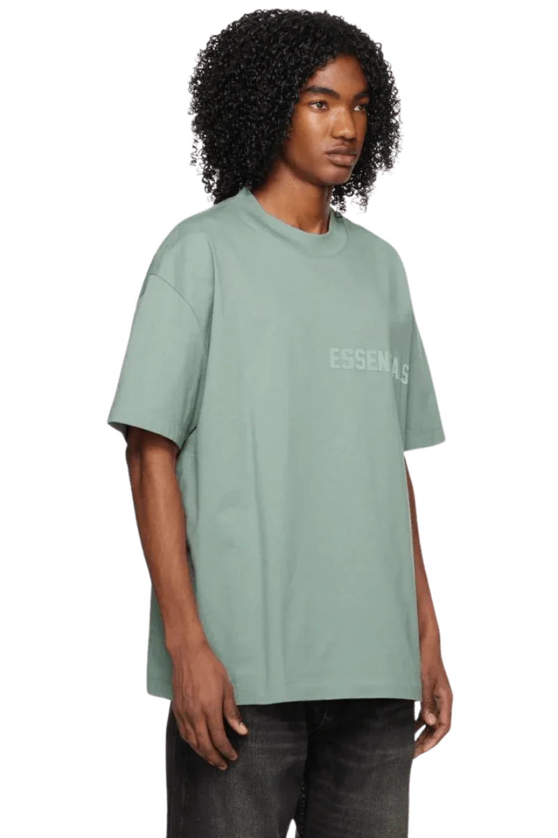 Fear Of God Essentials SS23 Rubber Embossed Tee in light green for a casual and stylish look